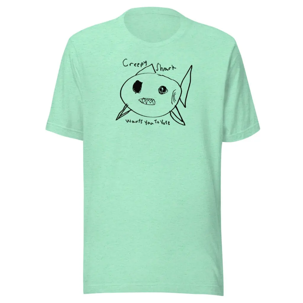 Childlike shark drawing with the phrase "Creepy Shark Wants You To Vote" in a playful handwritten style