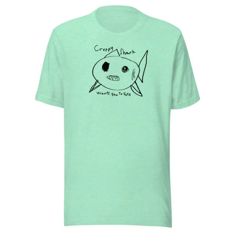 Childlike shark drawing with the phrase "Creepy Shark Wants You To Vote" in a playful handwritten style