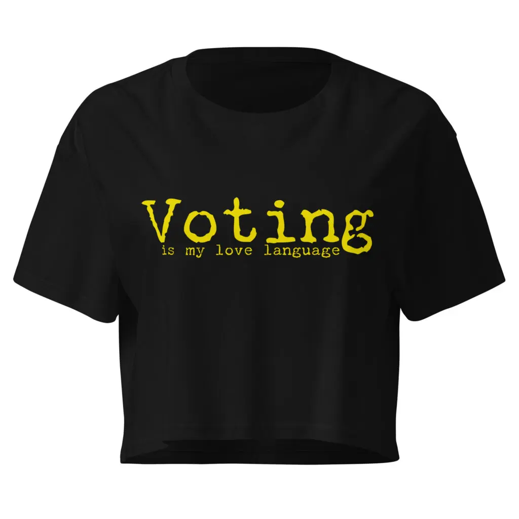 Graphic streetwear t-shirt featuring bold, distressed yellow text that reads 'Voting is my love language' across a solid black background.