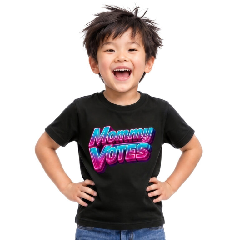 A smiling young boy wearing a black t-shirt with retro 80s neon gradient text that reads Mommy VOTES.